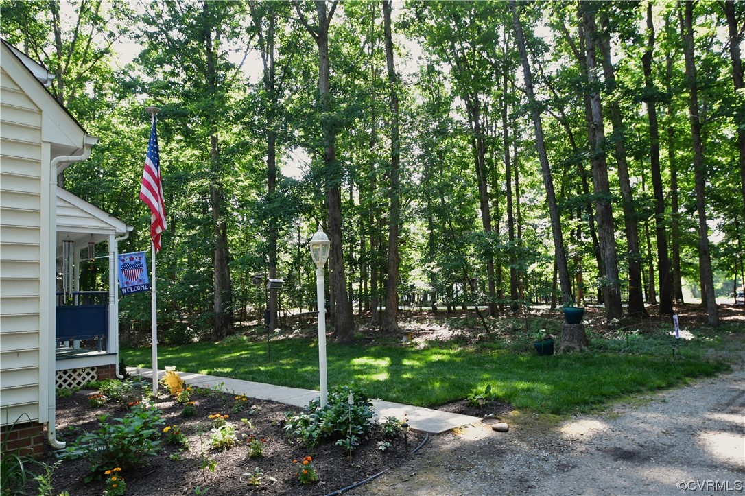 1438 Palmore Road Powhatan, VA 23139 - Photo 4 of 41 Front view of manicured yard.