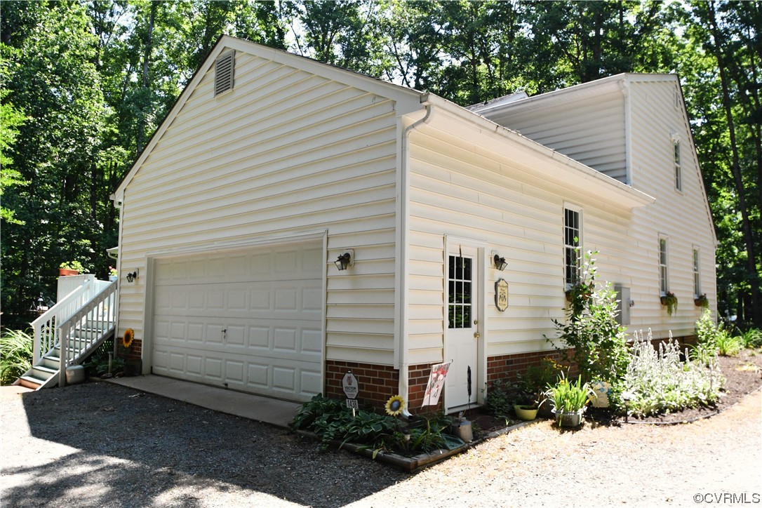 1438 Palmore Road Powhatan, VA 23139 - Photo 41 of 41 Side view of home and the oversized 2 car garage.