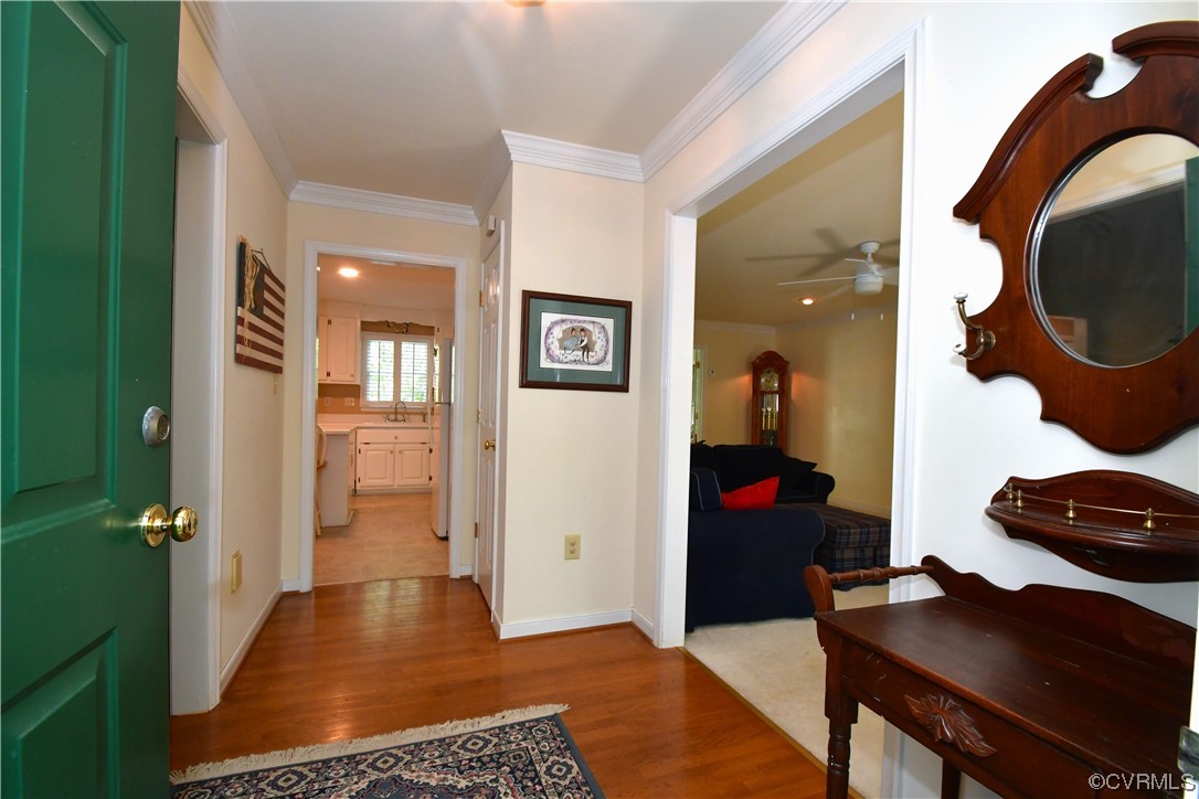 1438 Palmore Road Powhatan, VA 23139 - Photo 5 of 41 Walk into the home and have hardwood floors in foyer and formal dining to the left. Greatroom is to the right.