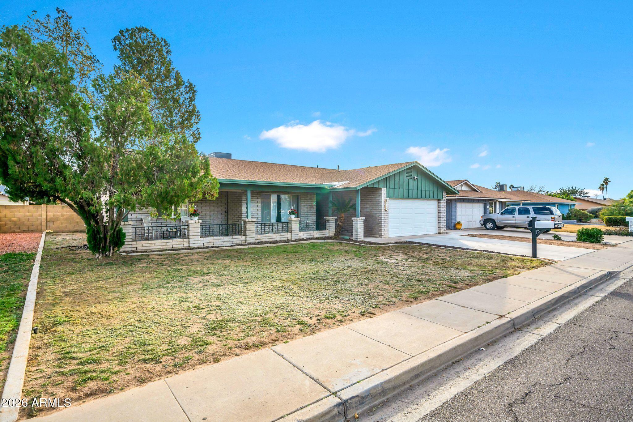 3041 West Acoma Drive Phoenix, AZ 85053 - Photo 21 of 35 a view of a house with a swimming pool