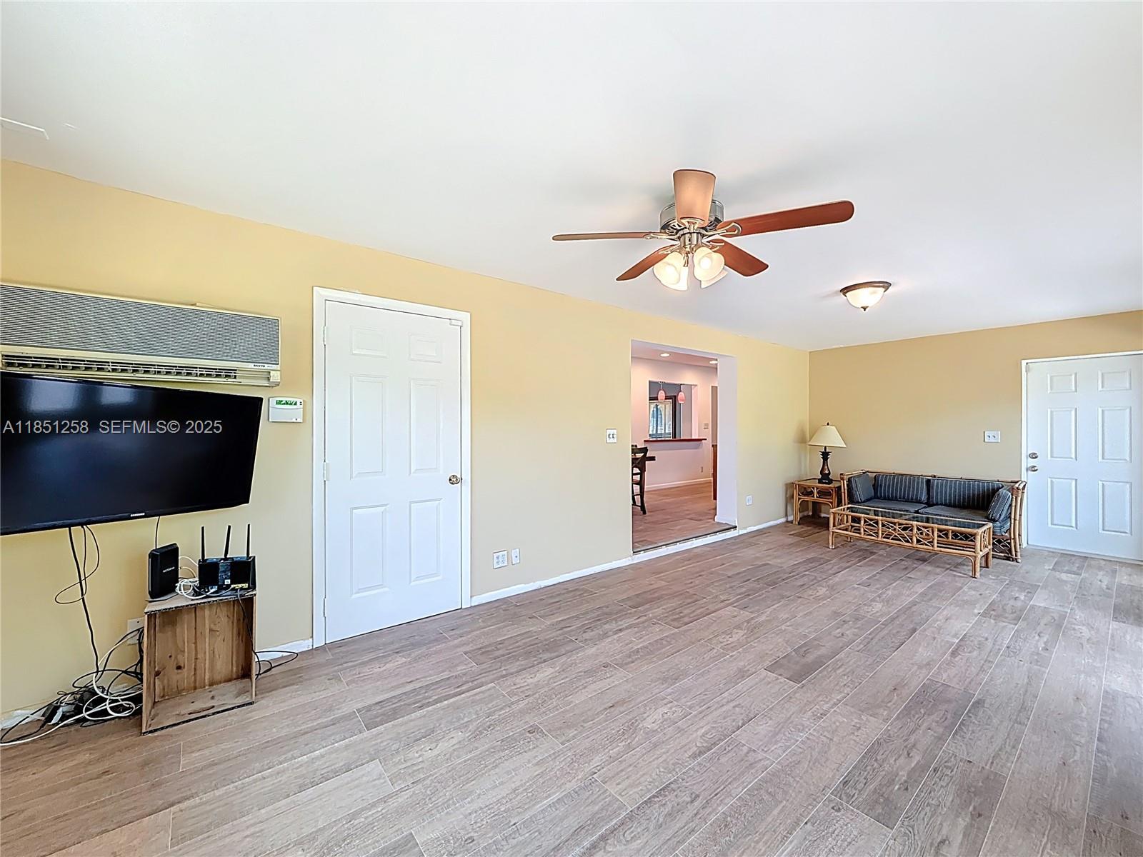 4911 Northeast 24th Avenue Lighthouse Point, FL 33064 - Photo 22 of 63 a view of livingroom with furniture and a flat screen tv