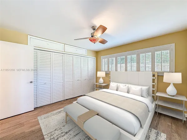 a house with a swimming pool in front of it