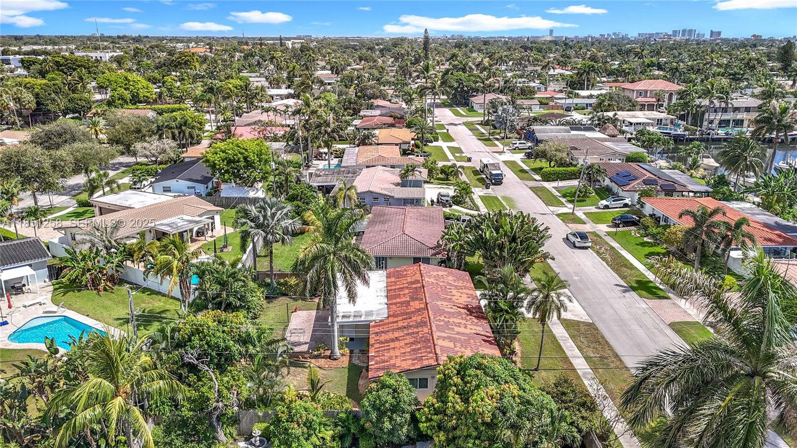 4911 Northeast 24th Avenue Lighthouse Point, FL 33064 - Photo 3 of 63 an aerial view of residential houses with outdoor space