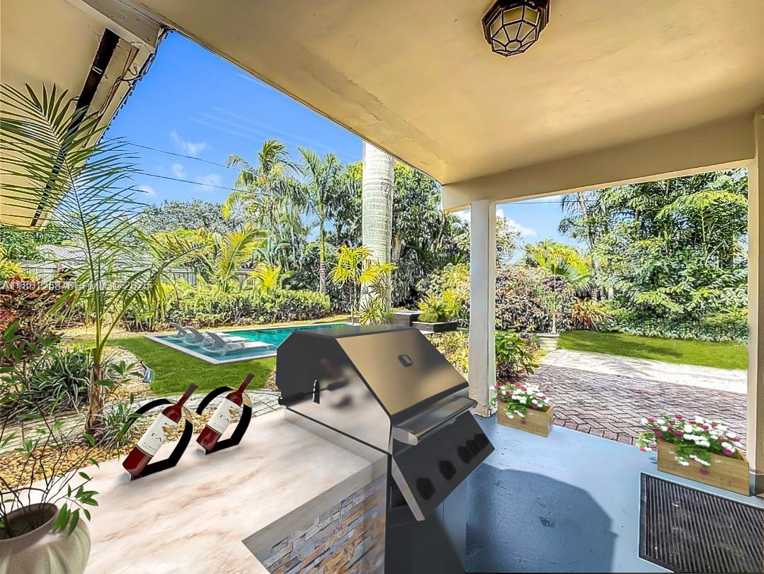 4911 Northeast 24th Avenue Lighthouse Point, FL 33064 - Photo 47 of 63 a view of an outdoor dining room with furniture