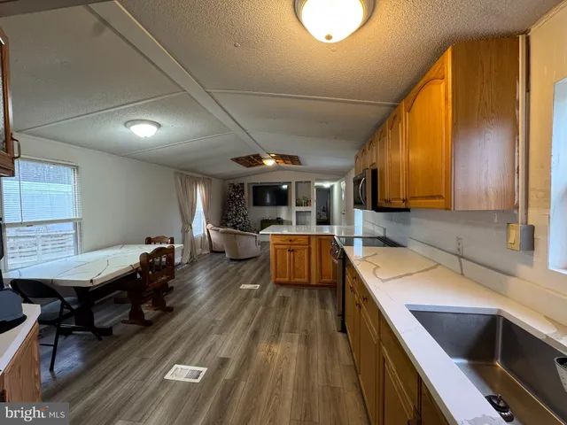 a bed room with a bed and a lamp