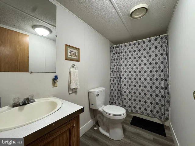 a bedroom with a bed and a closet