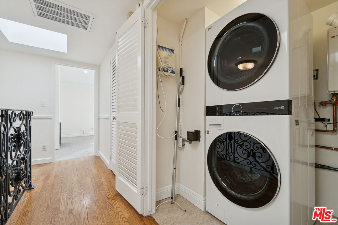 880 Hilldale Avenue, Unit 3 West Hollywood, CA 90069 - Photo 20 of 43 a view of a hallway with washer and dryer
