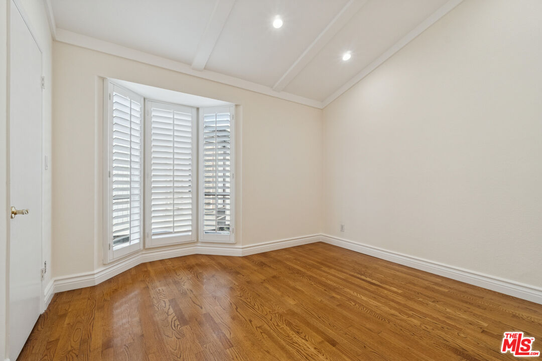 880 Hilldale Avenue, Unit 3 West Hollywood, CA 90069 - Photo 30 of 43 a view of empty room with wooden floor and fan