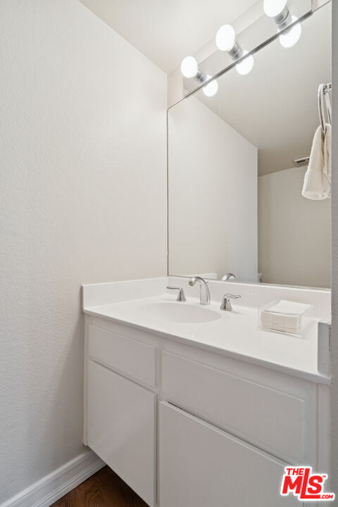 880 Hilldale Avenue, Unit 3 West Hollywood, CA 90069 - Photo 35 of 43 a bathroom with a sink and vanity