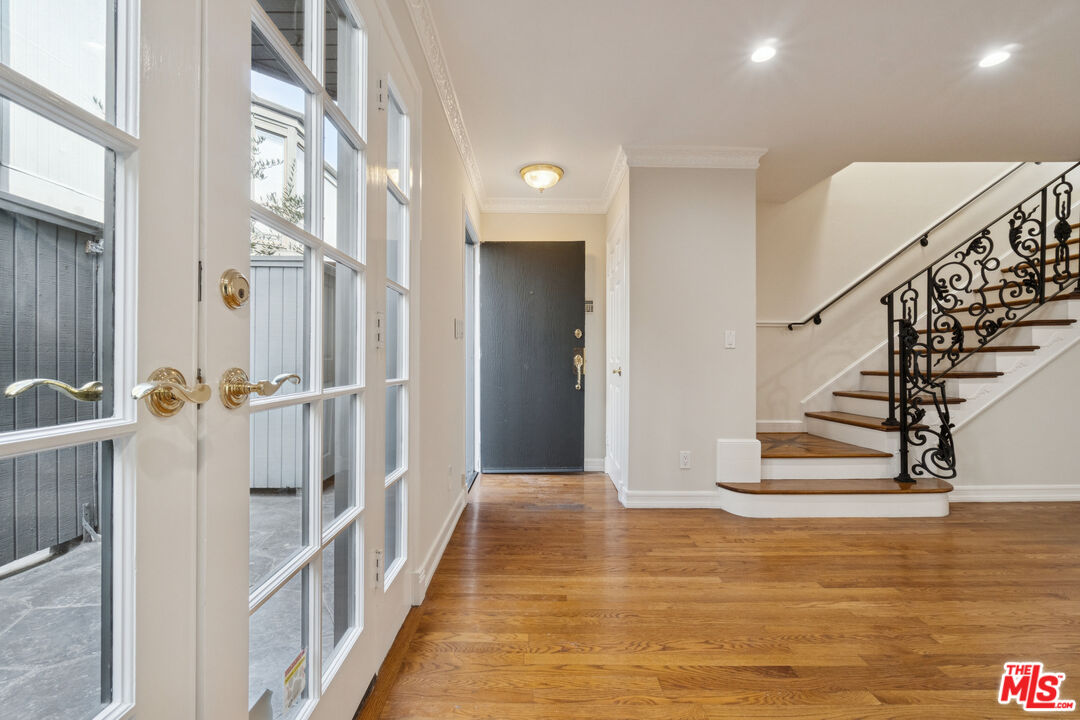 880 Hilldale Avenue, Unit 3 West Hollywood, CA 90069 - Photo 7 of 43 a view of entryway and hall with wooden floor