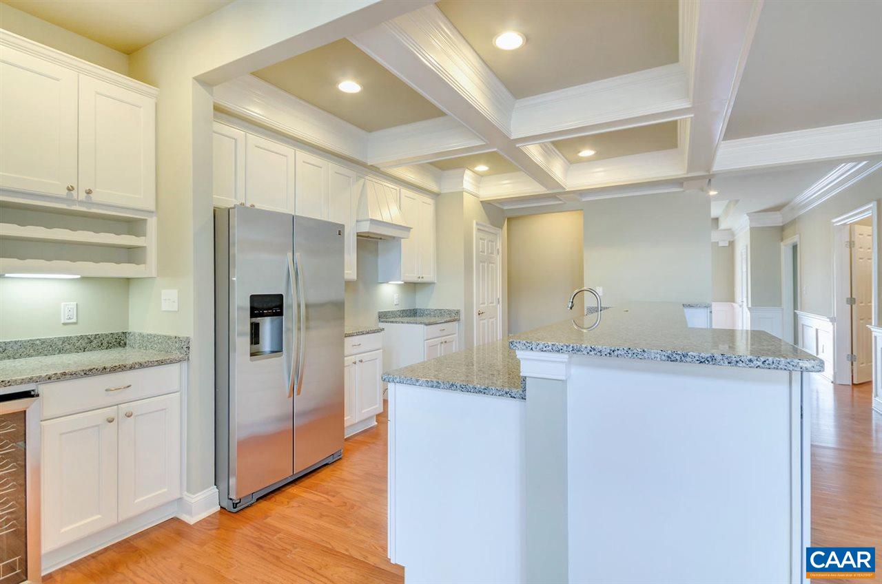2635 South Bennington Road Charlottesville, VA 22901 - Photo 7 of 28 a kitchen with granite countertop a refrigerator and a sink