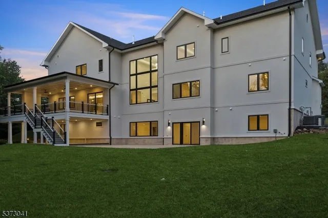 a view of a city with lush green forest