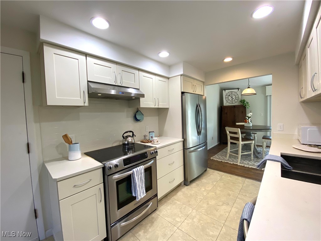 1024 Canyon View Road Northfield, OH 44067 - Photo 18 of 38 Updated kitchen into eating area