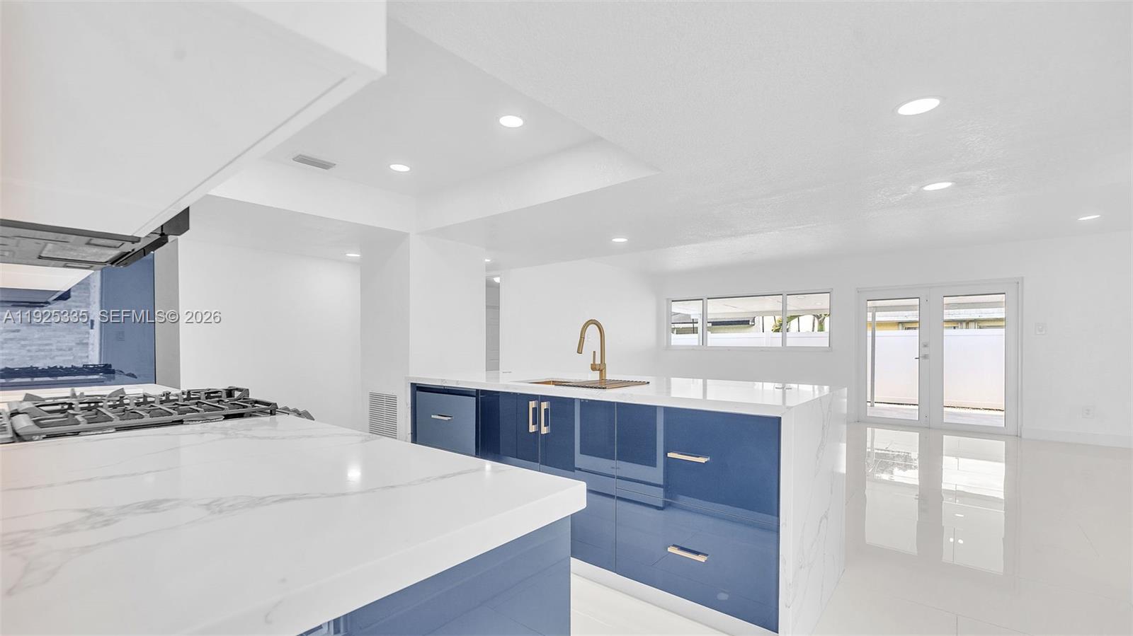 11421 Southwest 84th Street, Unit 1 Miami, FL 33173 - Photo 14 of 44 a bedroom with a bed and a dresser