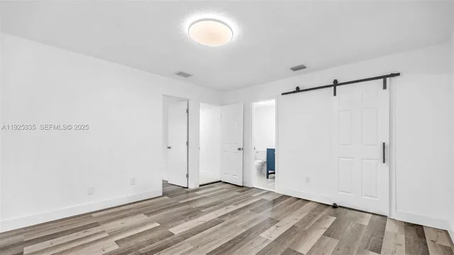 a view of room with walk in closet