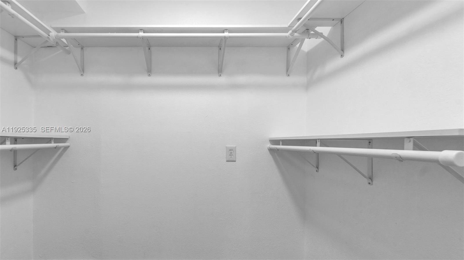 11421 Southwest 84th Street, Unit 1 Miami, FL 33173 - Photo 29 of 44 a view of walk in closet