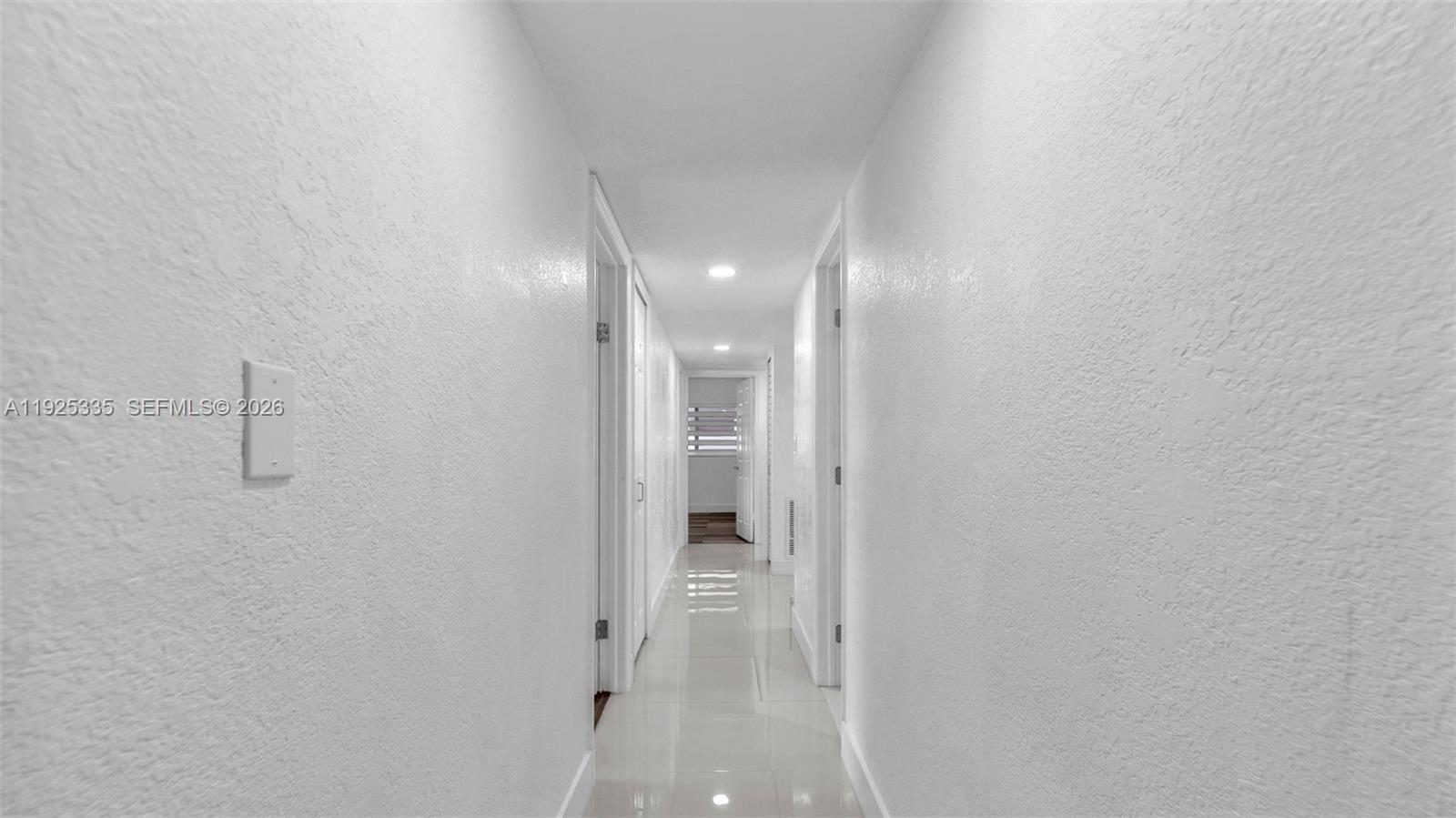 11421 Southwest 84th Street, Unit 1 Miami, FL 33173 - Photo 33 of 44 a bathroom with a shower