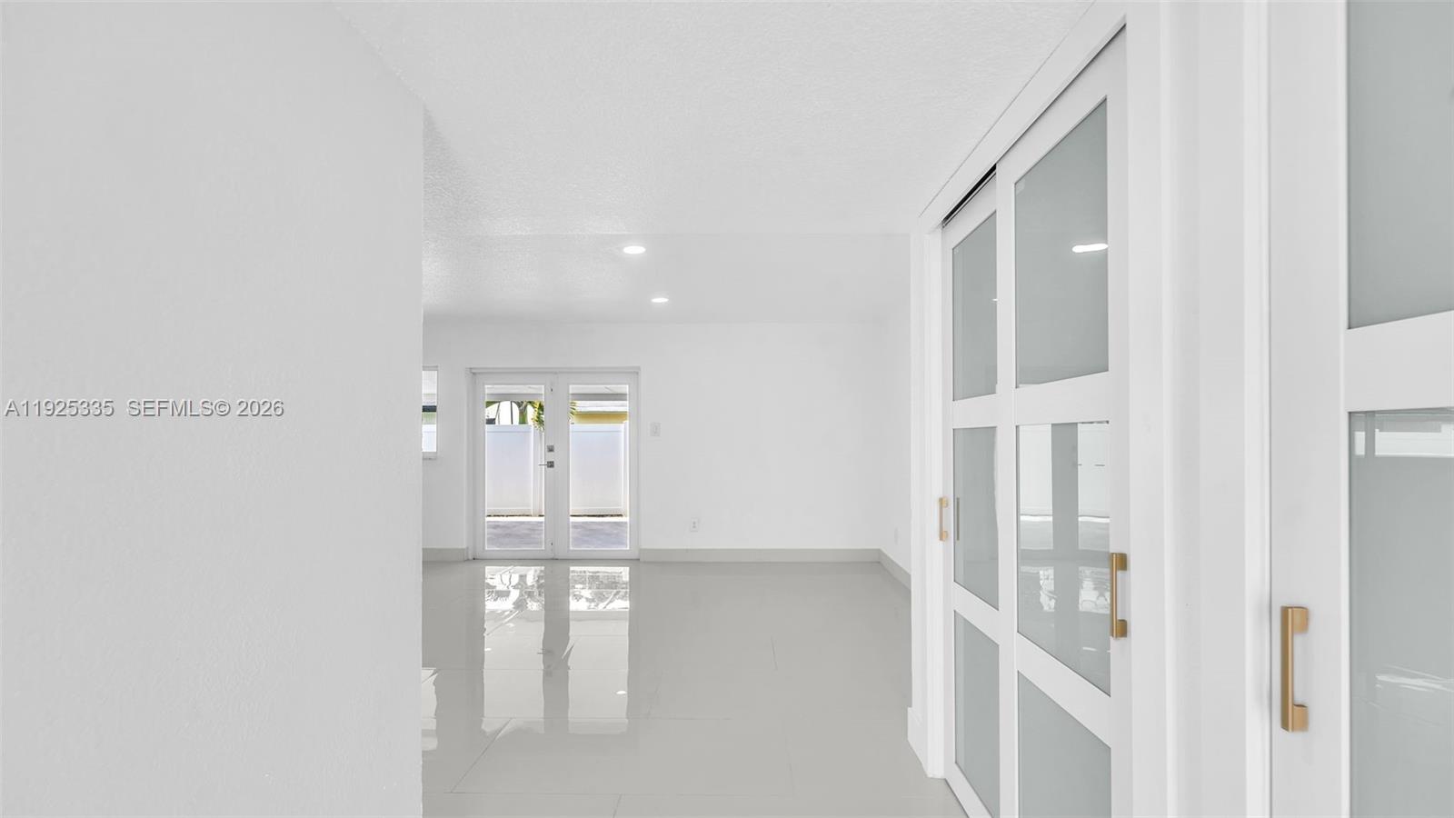 11421 Southwest 84th Street, Unit 1 Miami, FL 33173 - Photo 5 of 44 a view of hallway with stairs