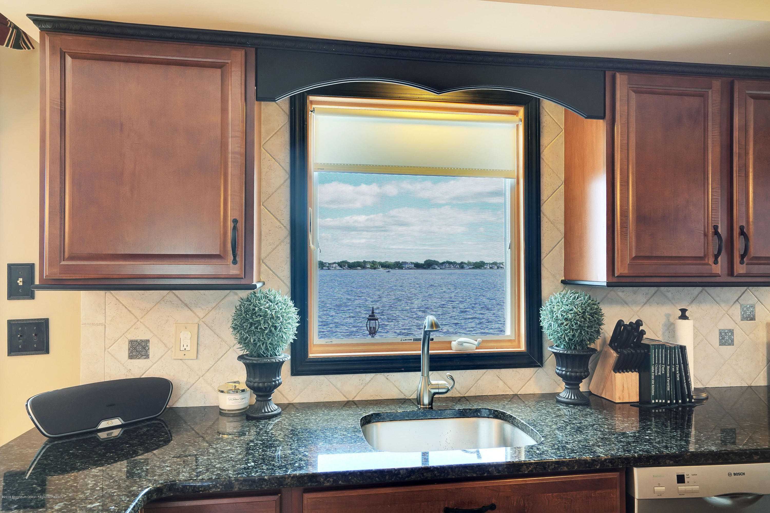 33 Hulse Landing Road Brick, NJ 08723 - Photo 13 of 42 a kitchen with granite countertop a sink and a window