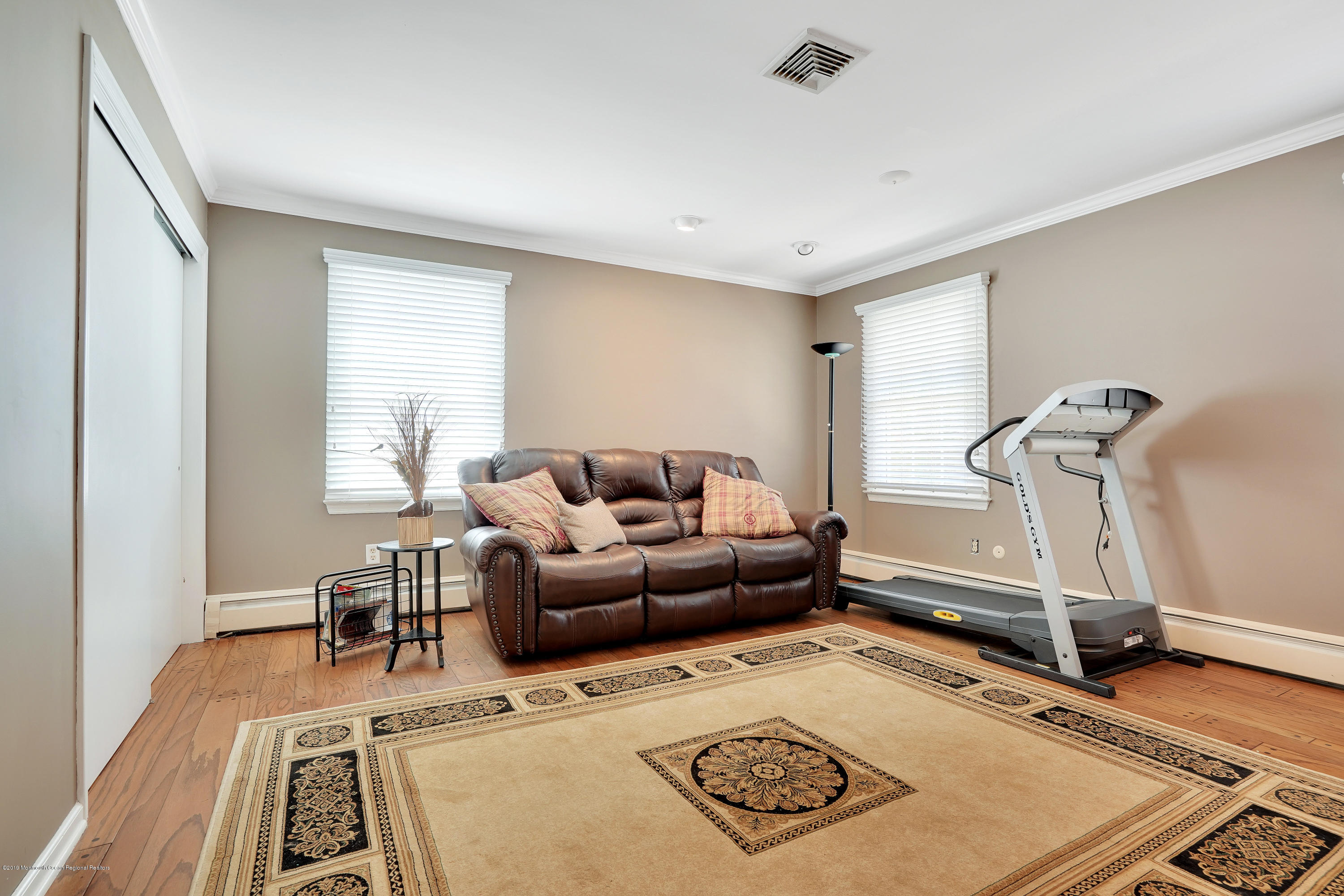 33 Hulse Landing Road Brick, NJ 08723 - Photo 18 of 42 a living room with furniture and a wooden floor