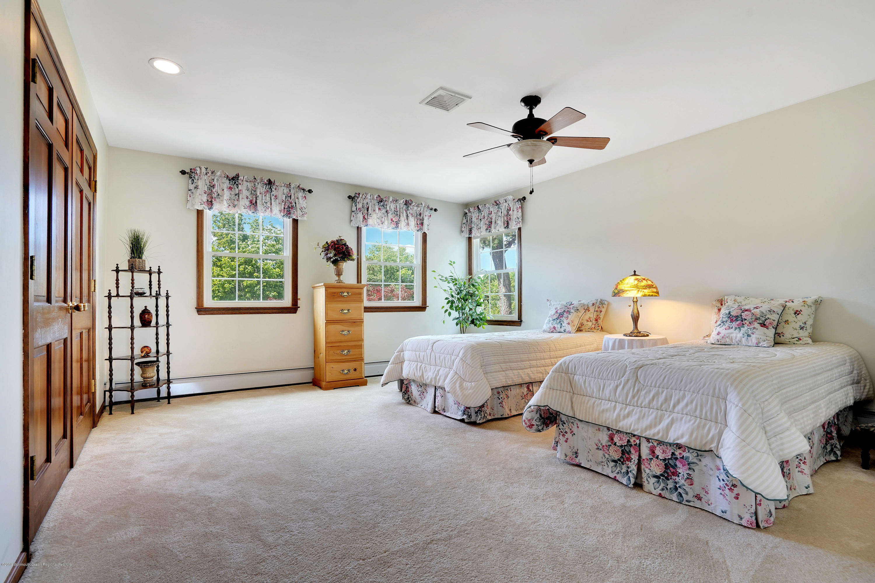 33 Hulse Landing Road Brick, NJ 08723 - Photo 21 of 42 a spacious bedroom with two beds and large windows