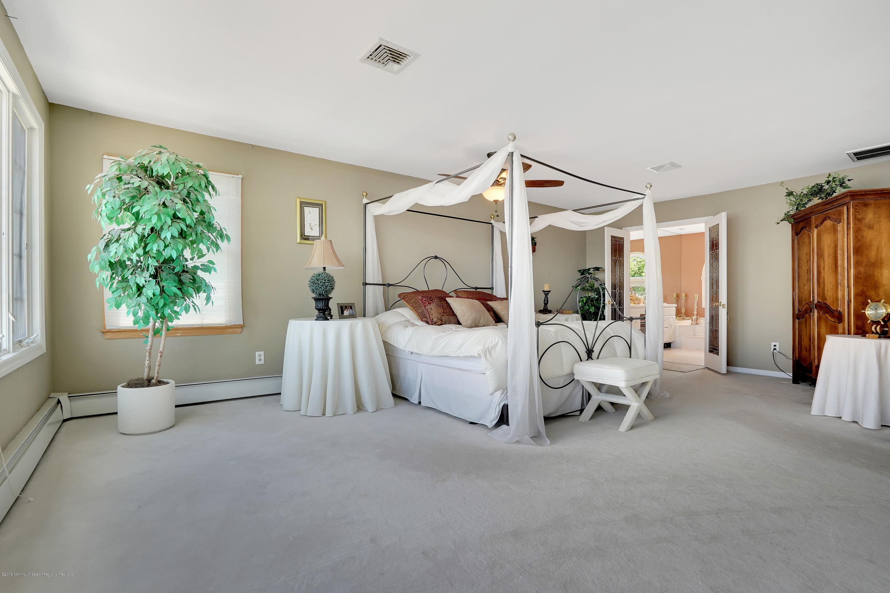 33 Hulse Landing Road Brick, NJ 08723 - Photo 24 of 42 a bedroom with furniture and a chandelier
