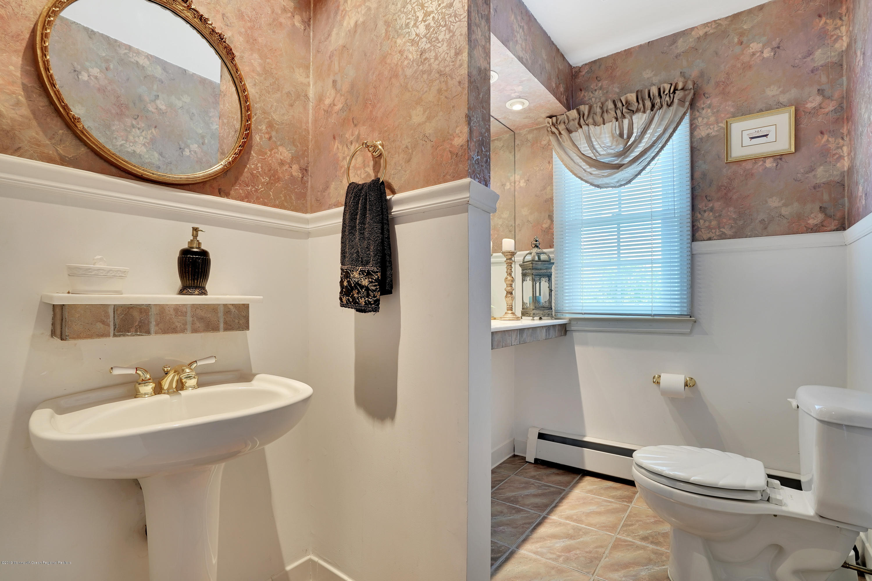 33 Hulse Landing Road Brick, NJ 08723 - Photo 28 of 42 a bathroom with a sink and a mirror