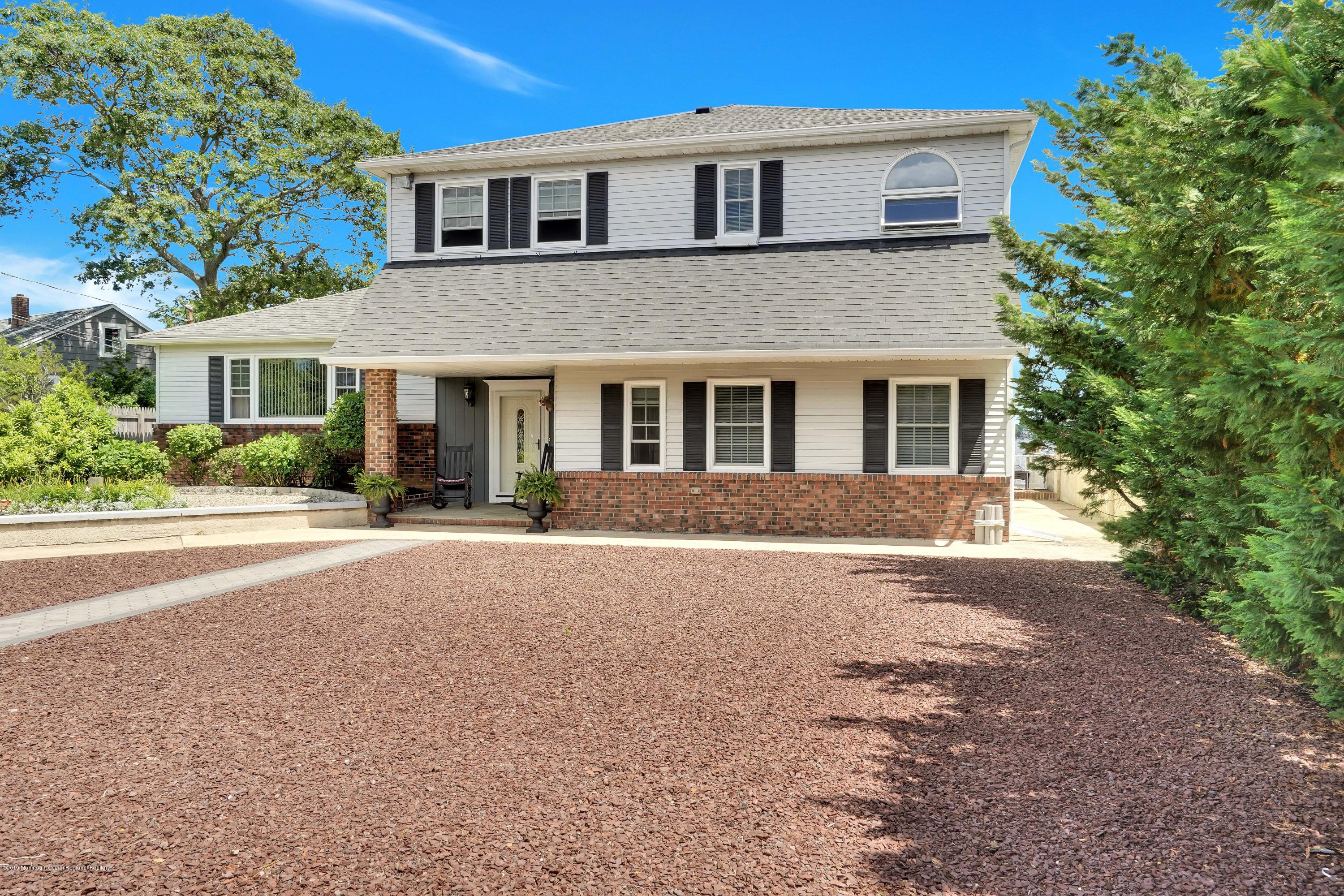 33 Hulse Landing Road Brick, NJ 08723 - Photo 34 of 42 front view of a house with a street