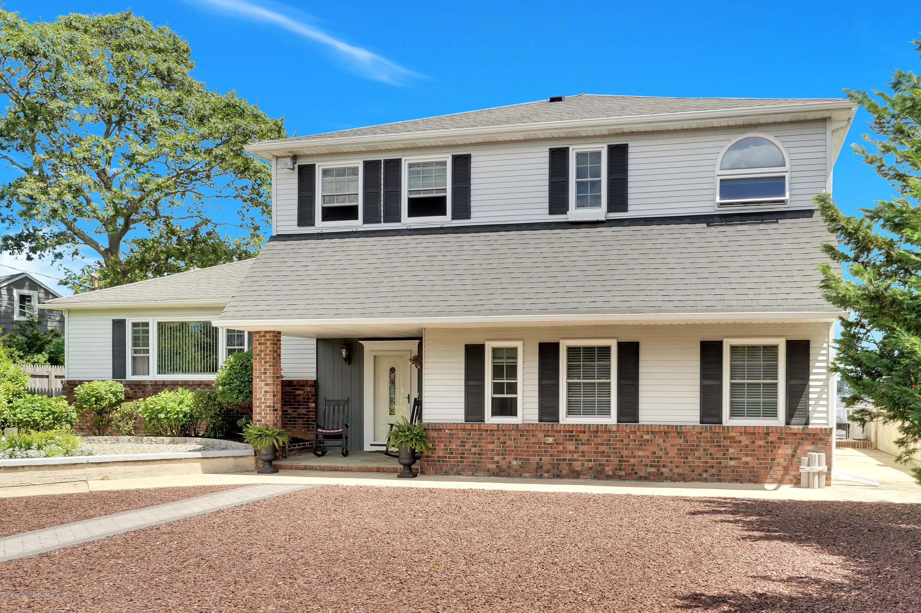 33 Hulse Landing Road Brick, NJ 08723 - Photo 35 of 42 a front view of a house with a yard