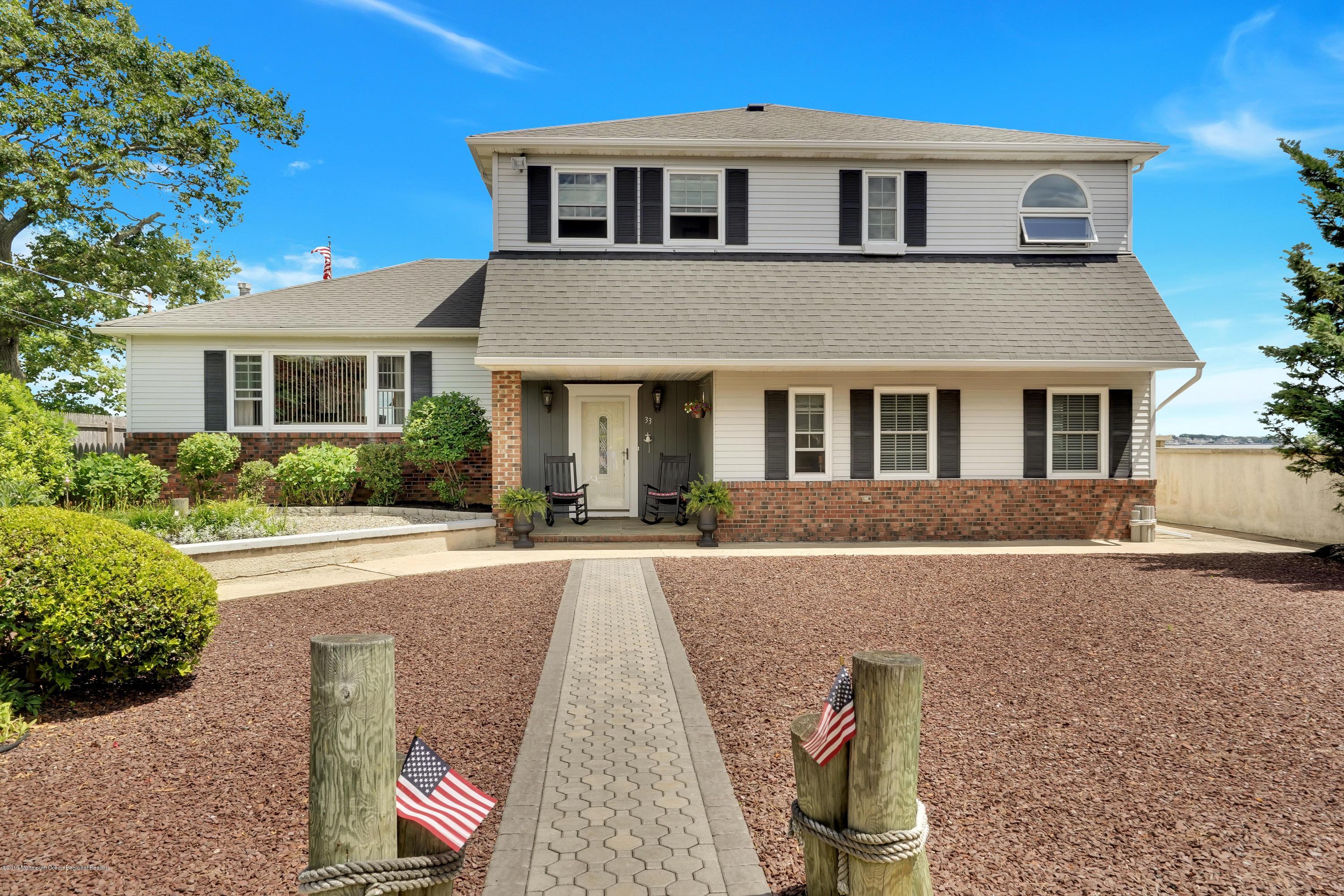 33 Hulse Landing Road Brick, NJ 08723 - Photo 36 of 42 front view of a house with a yard