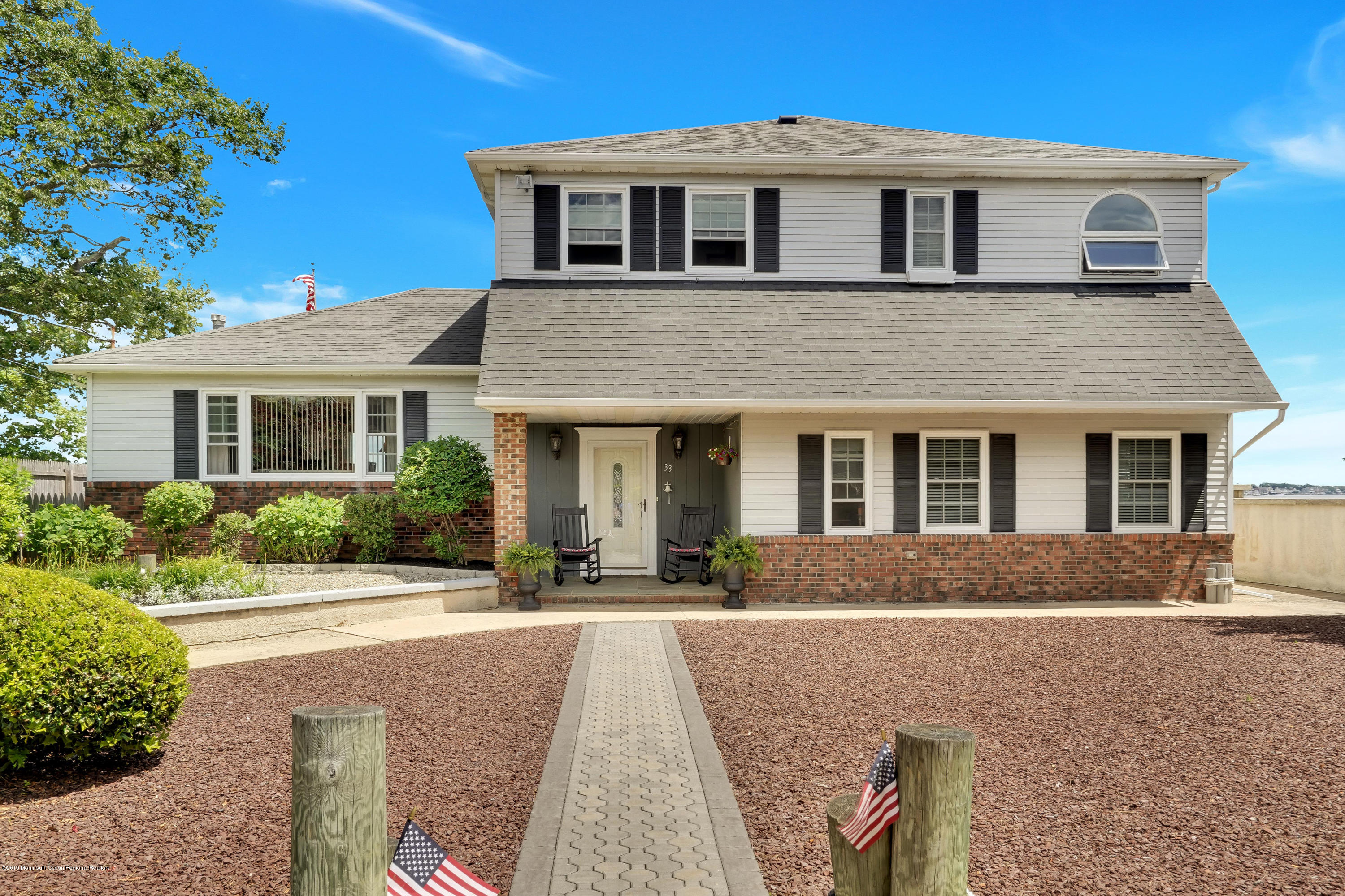 33 Hulse Landing Road Brick, NJ 08723 - Photo 37 of 42 a front view of a house with a yard