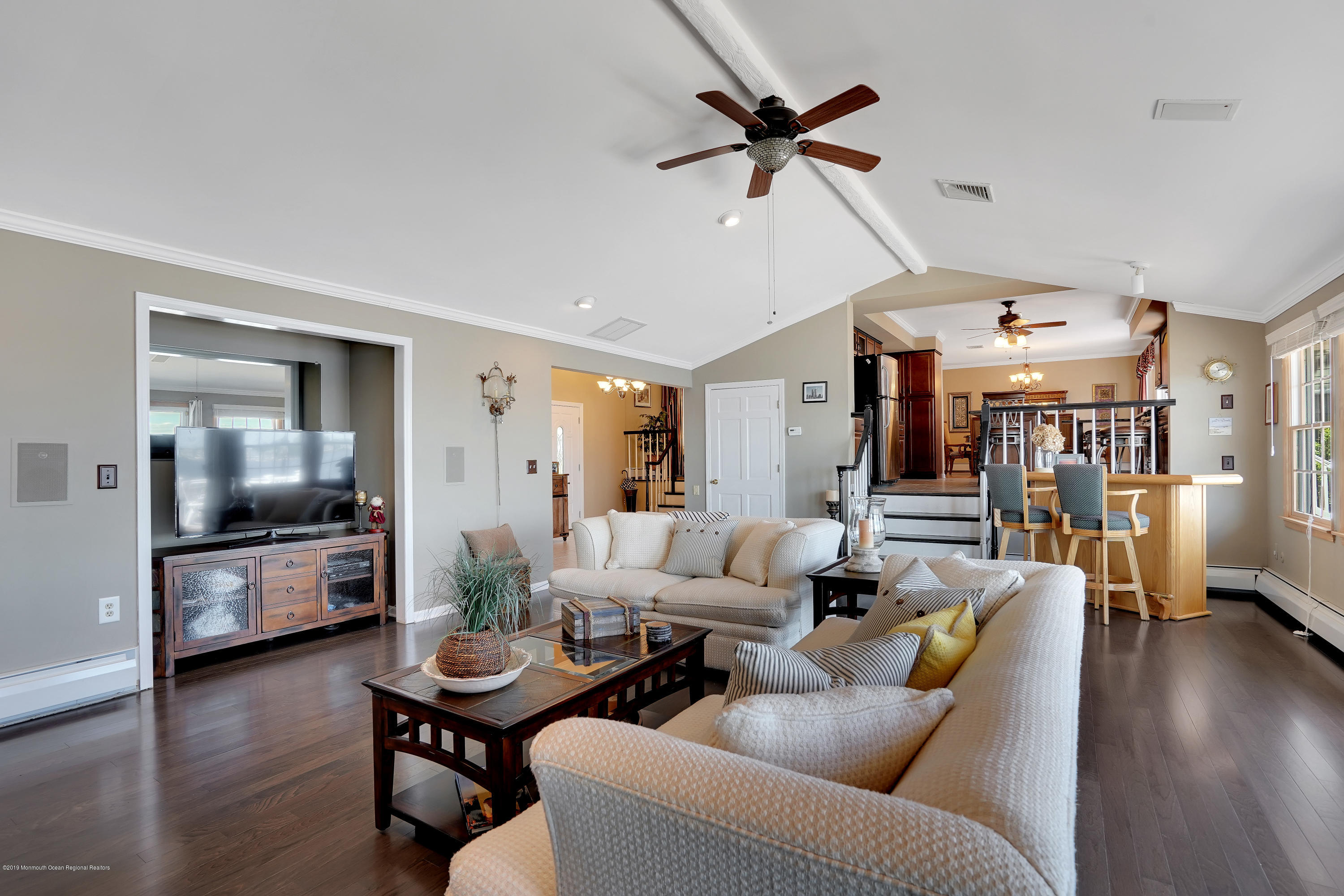 33 Hulse Landing Road Brick, NJ 08723 - Photo 6 of 42 a living room with furniture kitchen view and a wooden floor