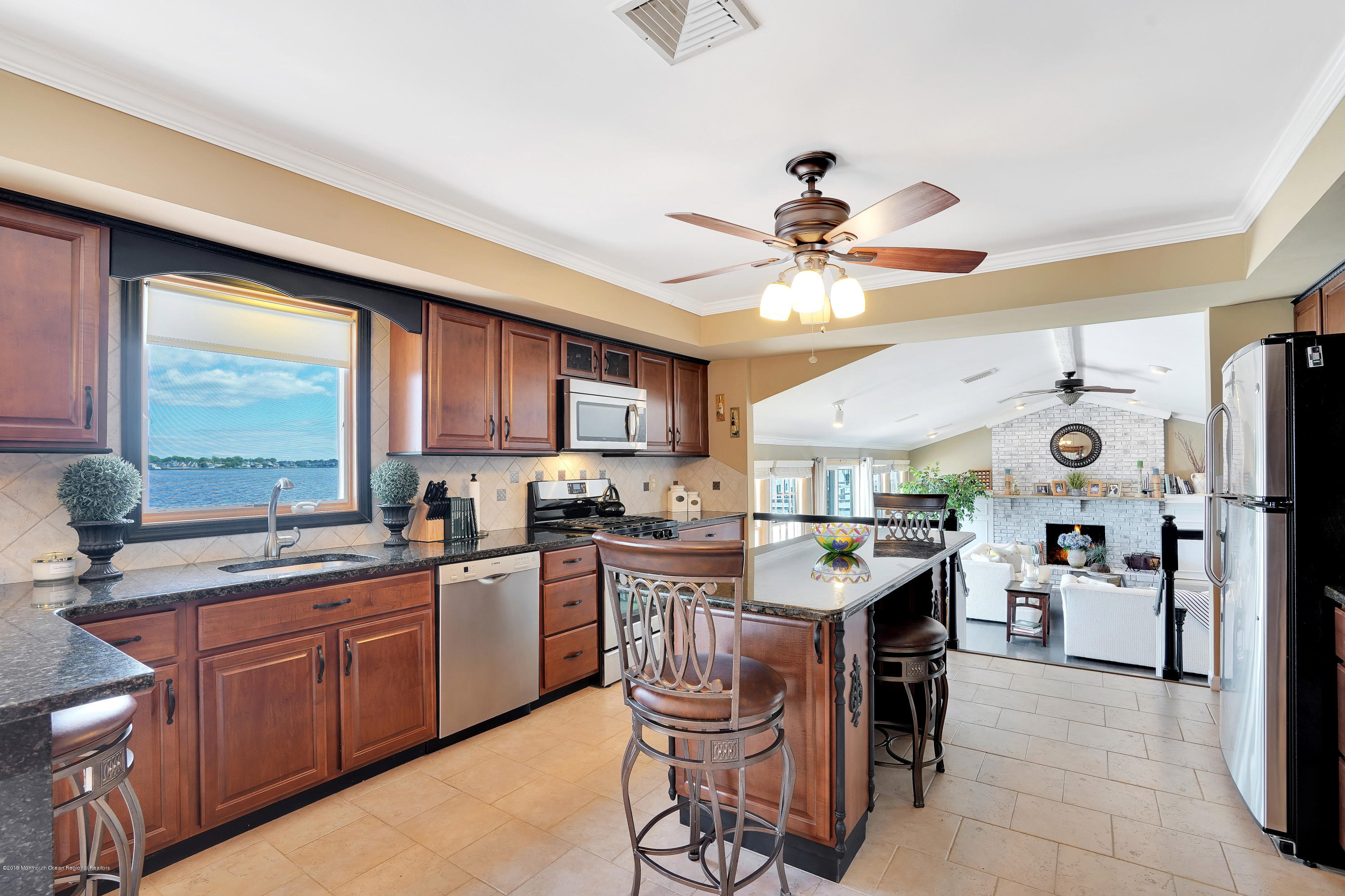 33 Hulse Landing Road Brick, NJ 08723 - Photo 9 of 42 a kitchen with a sink a stove and chairs