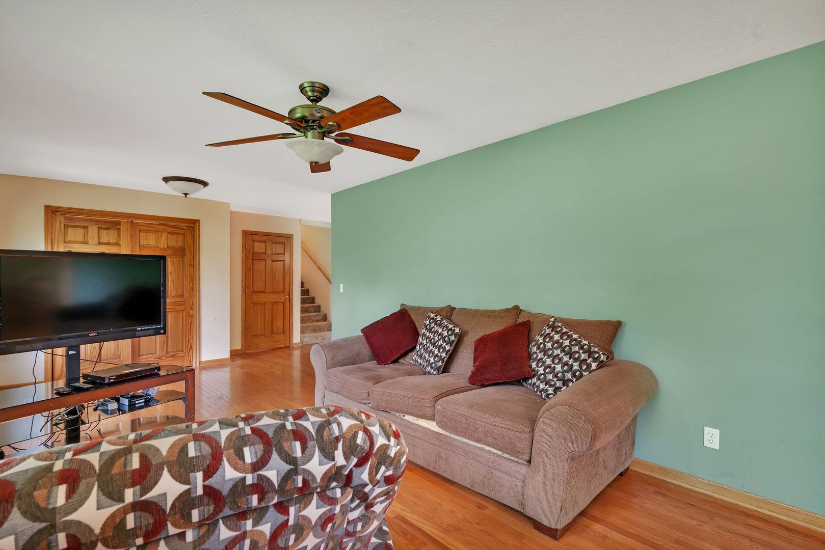 13130 McKanna Road Minooka, IL 60447 - Photo 15 of 56 a living room with furniture and a flat screen tv