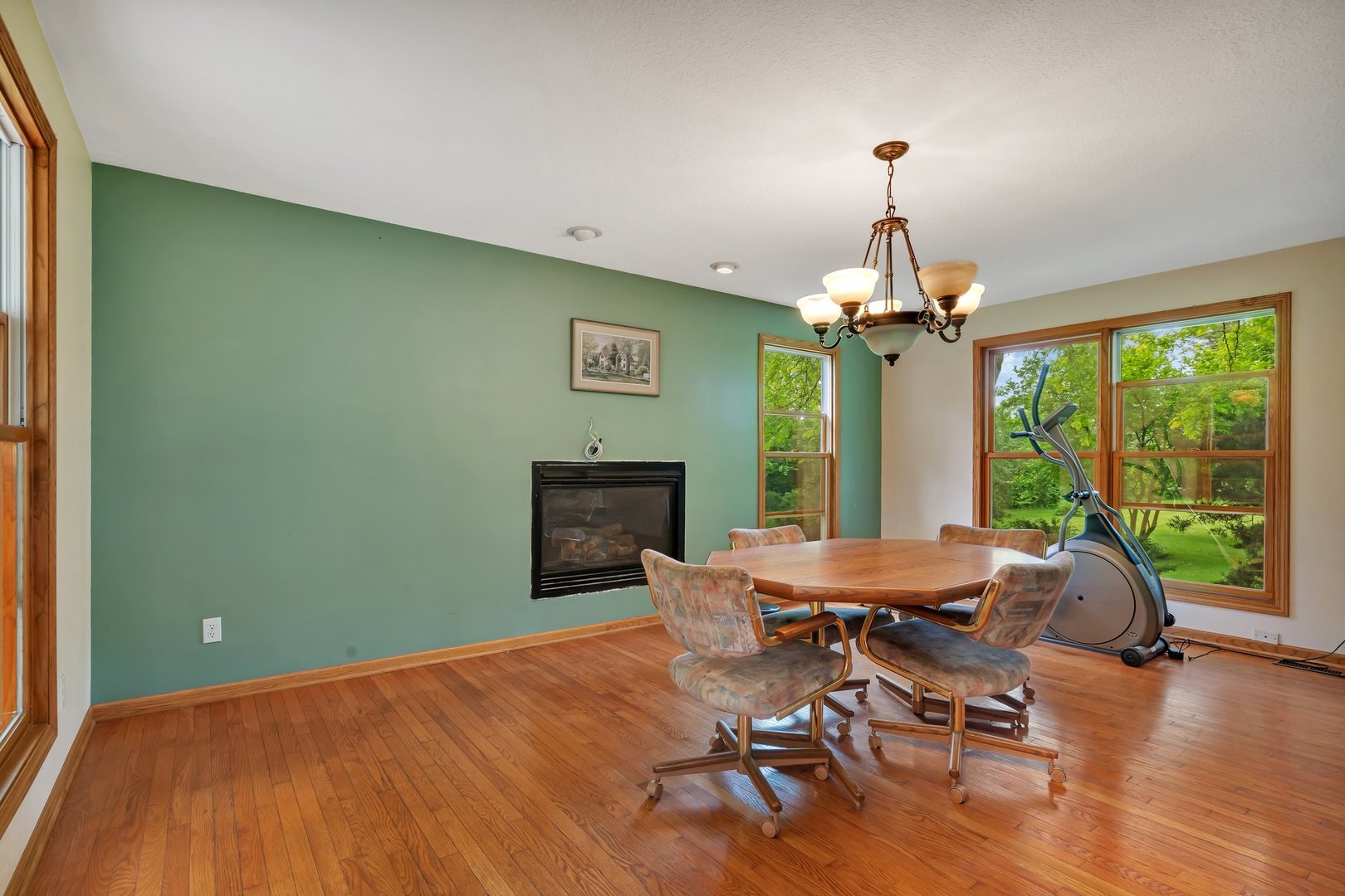 13130 McKanna Road Minooka, IL 60447 - Photo 18 of 56 a view of a dining room with furniture window and wooden floor