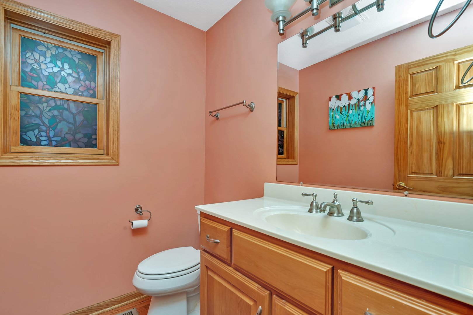 13130 McKanna Road Minooka, IL 60447 - Photo 19 of 56 a bathroom with a granite countertop sink mirror vanity and toilet