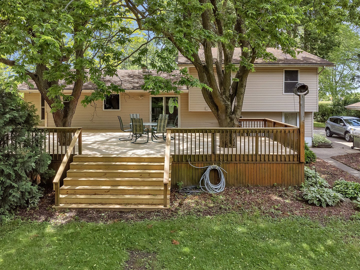 13130 McKanna Road Minooka, IL 60447 - Photo 39 of 56 a front view of a house with garden