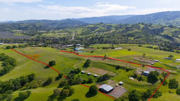 a view of a swimming pool with a lake view