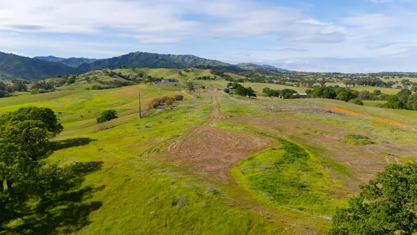a view of an ocean from a city