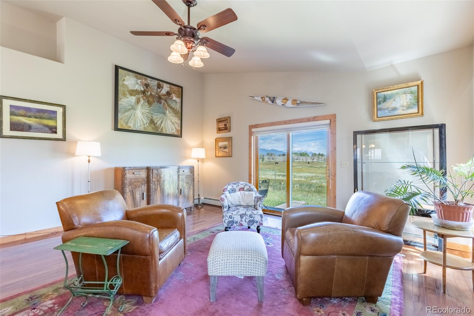 137 Starbuck Circle Salida, CO 81201 - Photo 30 of 50 a living room with furniture potted plant and a window