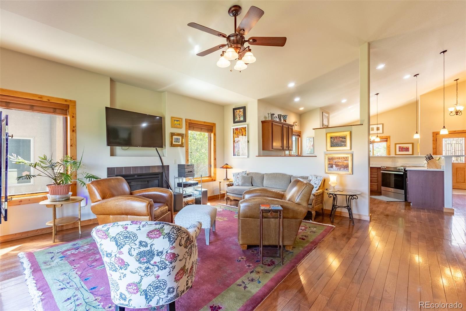137 Starbuck Circle Salida, CO 81201 - Photo 31 of 50 a living room with fireplace furniture and a flat screen tv