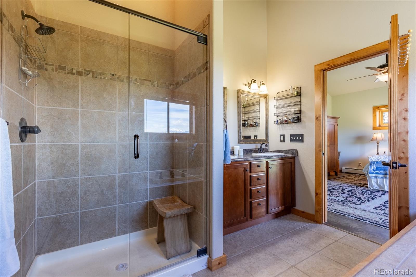 137 Starbuck Circle Salida, CO 81201 - Photo 38 of 50 a bathroom with a shower and a sink
