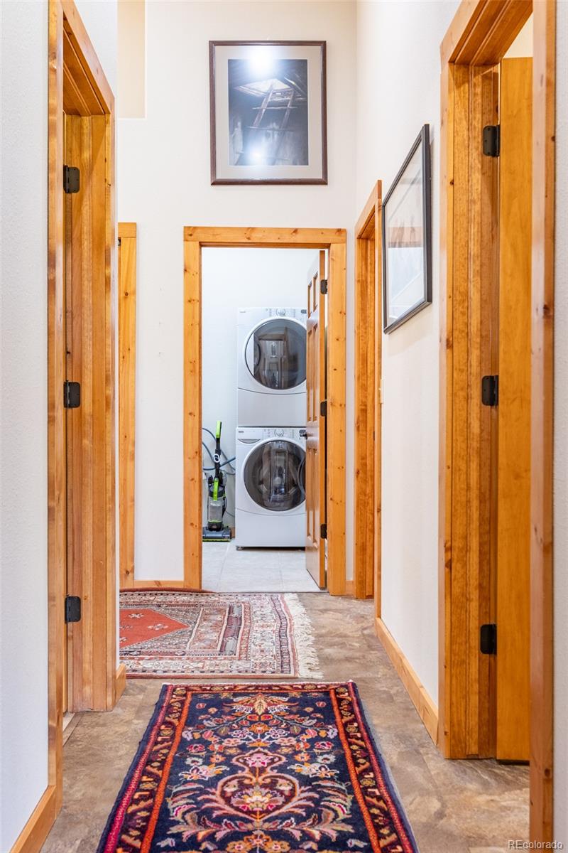 137 Starbuck Circle Salida, CO 81201 - Photo 41 of 50 a bedroom with a bed and a rug