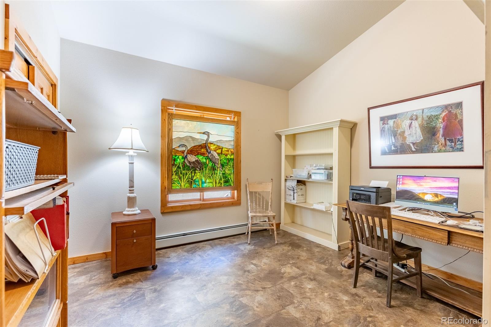 137 Starbuck Circle Salida, CO 81201 - Photo 42 of 50 a living room with furniture and a flat screen tv