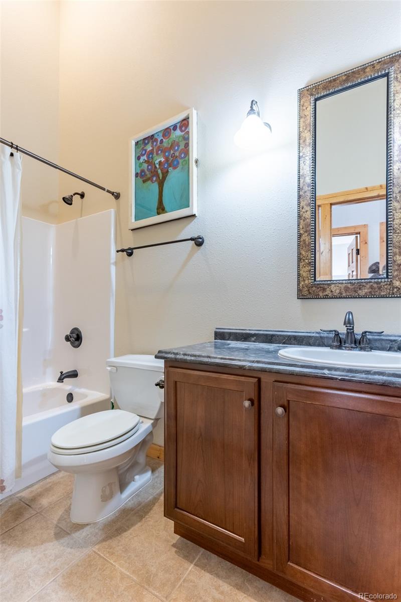 137 Starbuck Circle Salida, CO 81201 - Photo 48 of 50 a bathroom with a sink toilet and shower