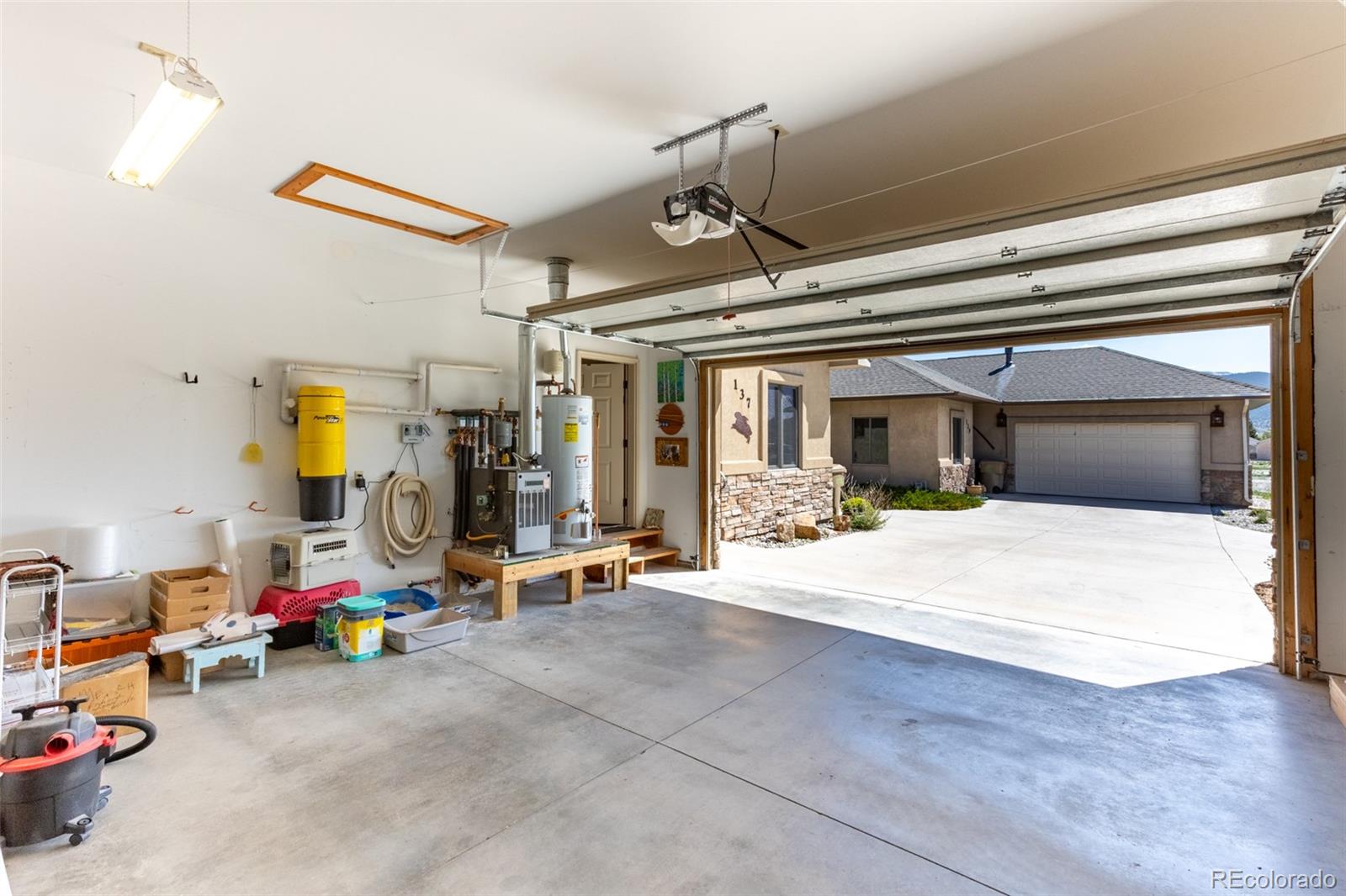 137 Starbuck Circle Salida, CO 81201 - Photo 50 of 50 a bedroom with furniture a flat screen tv and a window