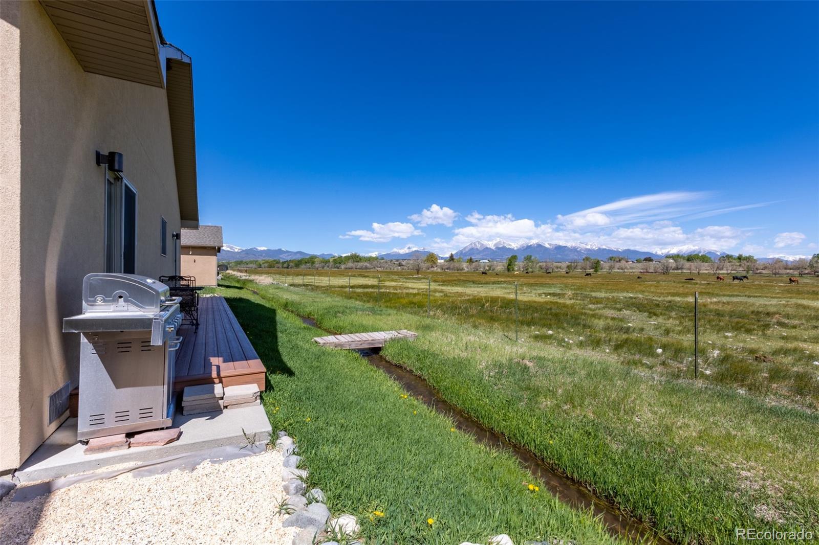 137 Starbuck Circle Salida, CO 81201 - Photo 9 of 50 a view of a garden with a building in the background