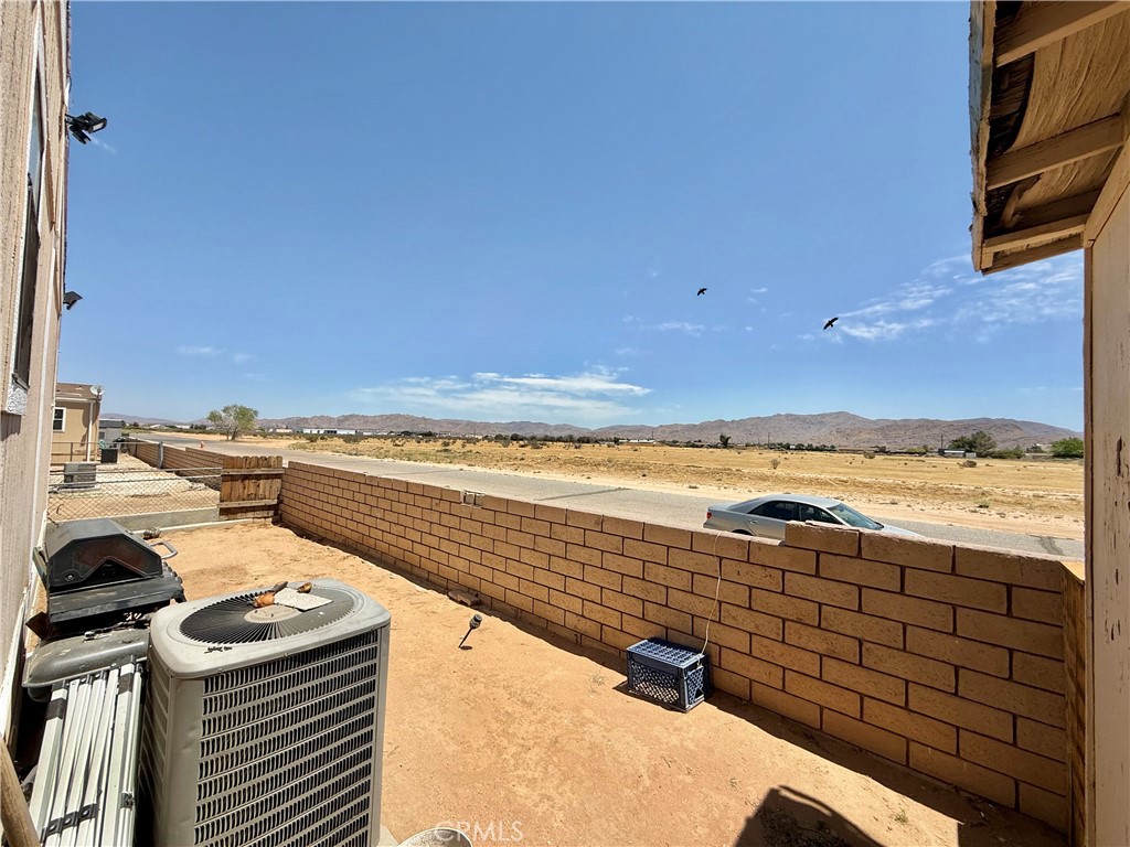 22020 Nisqually Road, Unit 65 Apple Valley, CA 92308 - Photo 5 of 14 a view of an ocean and beach