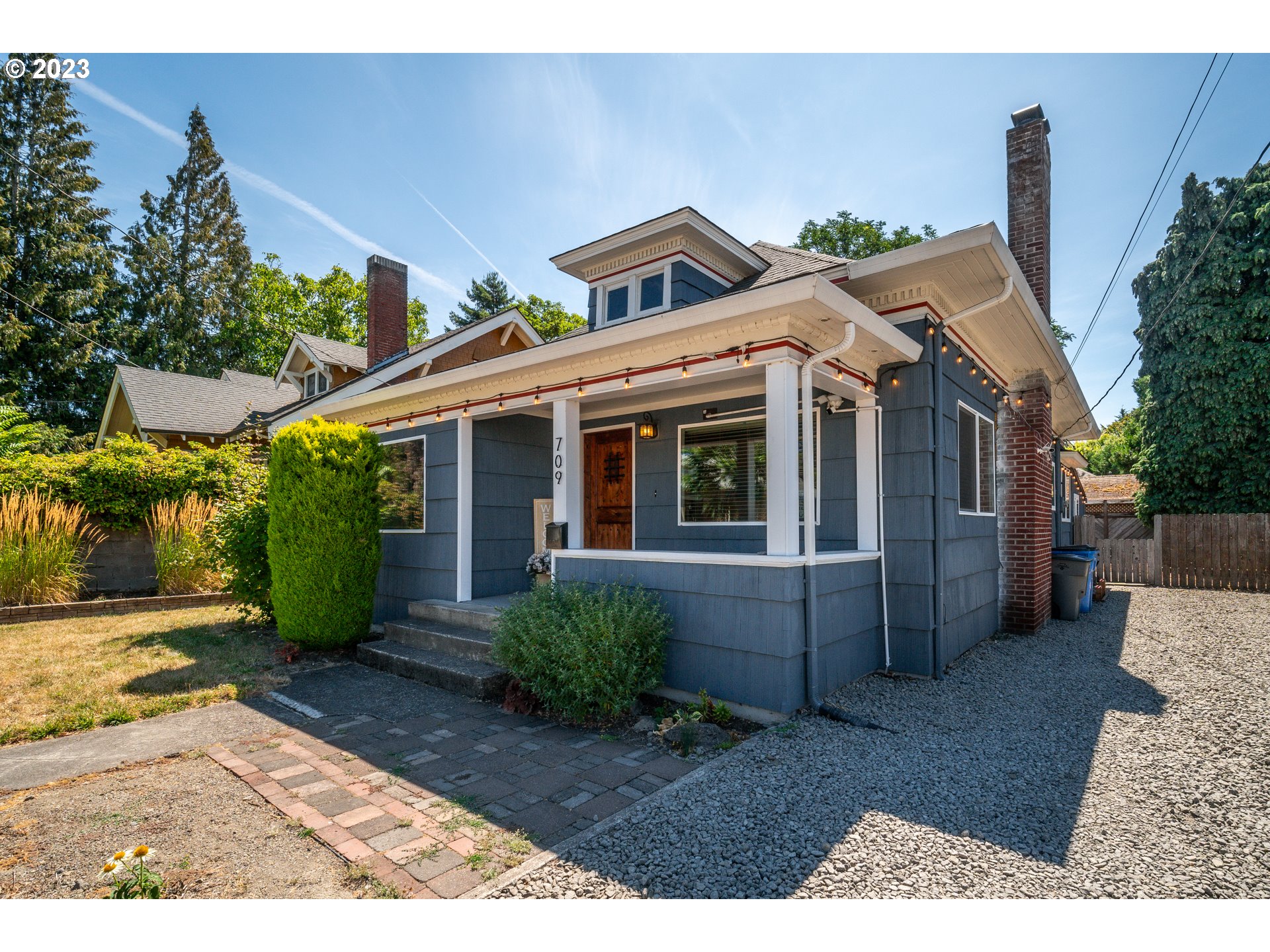 709 West Fourth Plain Boulevard Vancouver, WA 98660 - Photo 2 of 29 a view of a house with a patio