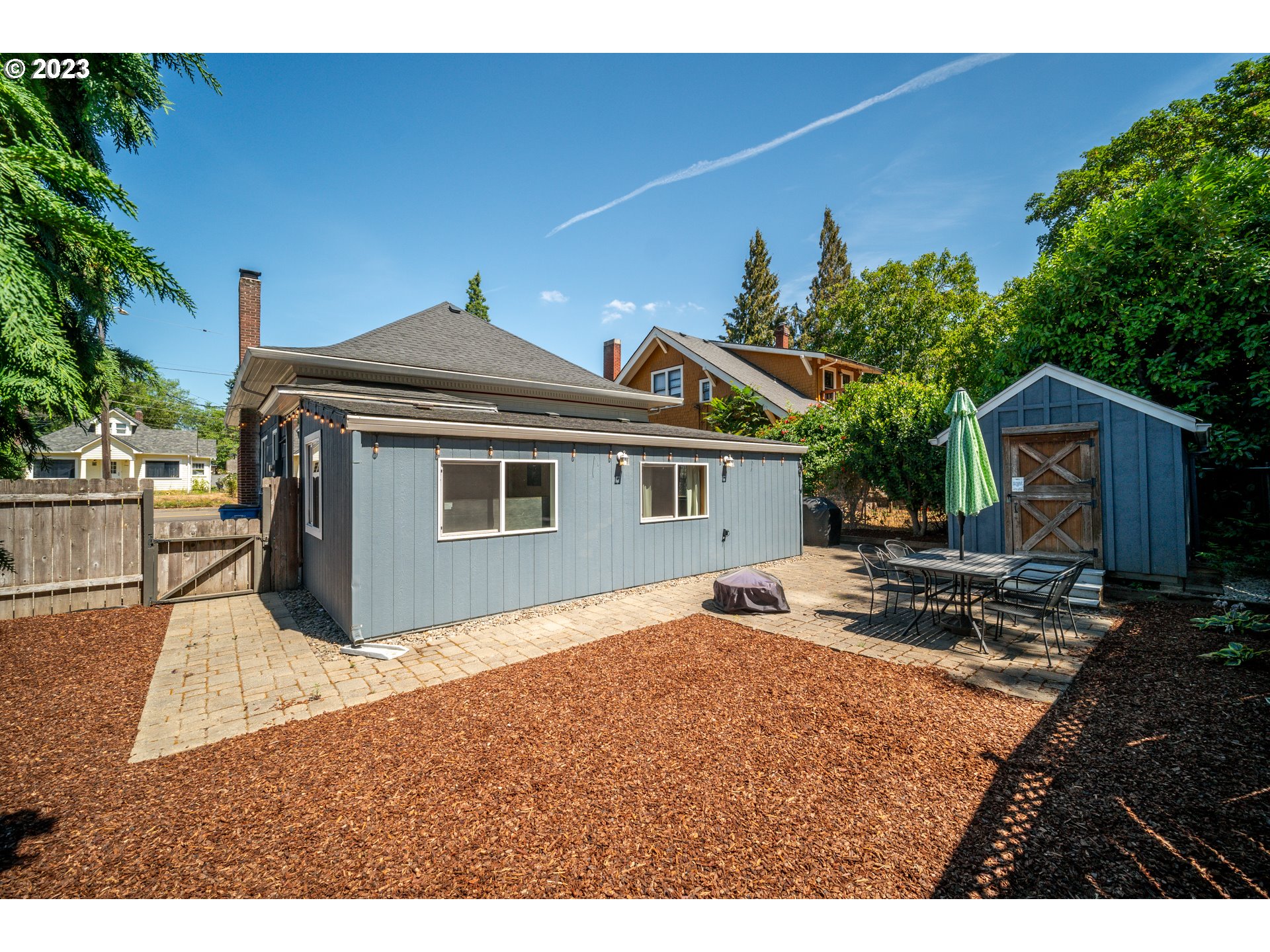 709 West Fourth Plain Boulevard Vancouver, WA 98660 - Photo 25 of 29 a front view of a house with a garden